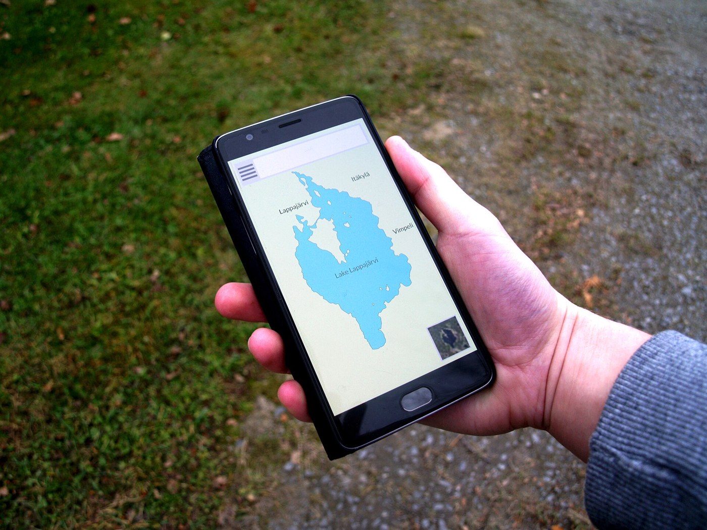 Phone displaying a map application; illustrative image